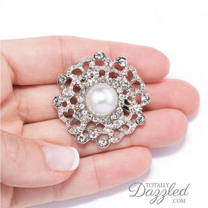 pearl wedding brooches in Hand