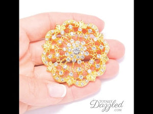 GOLD BROOCH WITH RHINESTONES